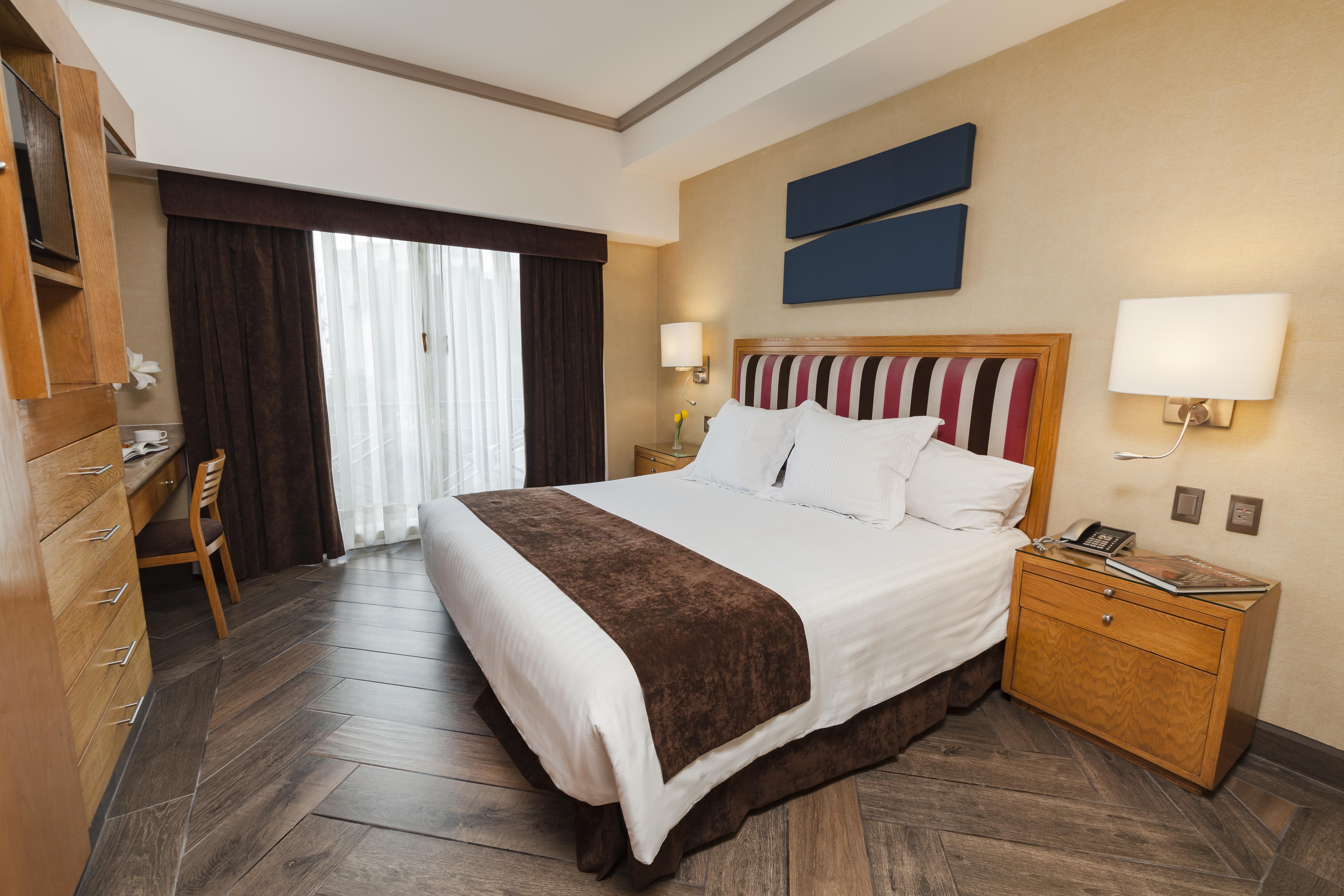 Del ángel Apartahotel